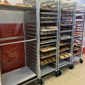 Tiffany's Bakery - trays of doughnuts on racks - Bakeries Near Me - Paterson, New Jersey Tiffany's Bakery - trays of doughnuts on racks - Bakeries Near Me - Paterson, New Jersey