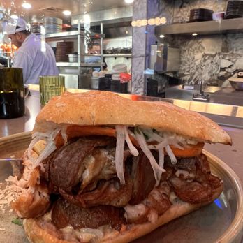 Lucuma Kitchen and Bar - Pan con Chicharron - Peruvian Near Me - Oakland, California Lucuma Kitchen and Bar - Pan con Chicharron - Peruvian Near Me - Oakland, California
