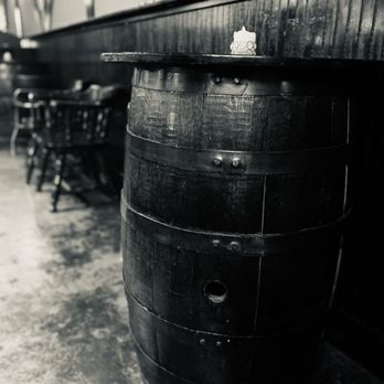 Ashford Pub - an old wooden barrel and bar stools - Pubs Near Me - Houston, Texas Ashford Pub - an old wooden barrel and bar stools - Pubs Near Me - Houston, Texas