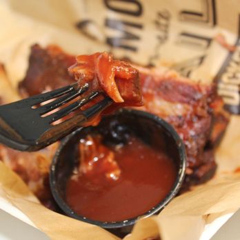 Dickey's Barbecue Pit - a fork in a piece of meat - Barbeque Near Me - Mandan, North Dakota Dickey's Barbecue Pit - a fork in a piece of meat - Barbeque Near Me - Mandan, North Dakota