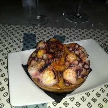 Vinitus - Grilled Octupus over a sweet potato mash. - Tapas Bars Near Me - Barcelona, B Vinitus - Grilled Octupus over a sweet potato mash. - Tapas Bars Near Me - Barcelona, B