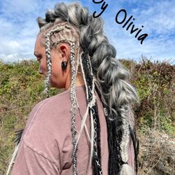 Salon534 - An updo with braids! synthetic hair and faux locs were fed in to create this full beautiful style.