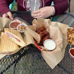 Sunpie's Bistro - Sunpie Sammy. Bbq/buffalo mix wings. Toothpicks