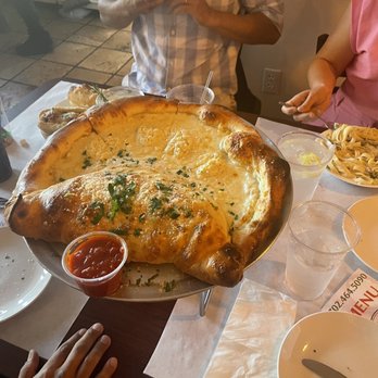 Amano - 1/2 pizza & 1/2 Calzone. - Pizza Near Me - Las Vegas, Nevada