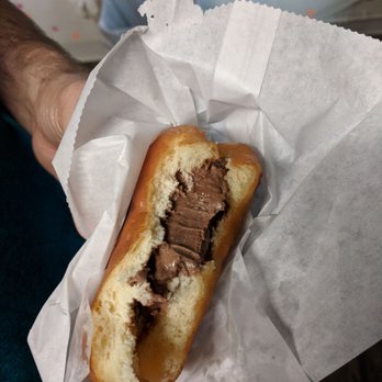 Novel Ice Cream - Chocolate icecream with Carmel sauce in a donut - Desserts Near Me - Phoenix, Arizona
