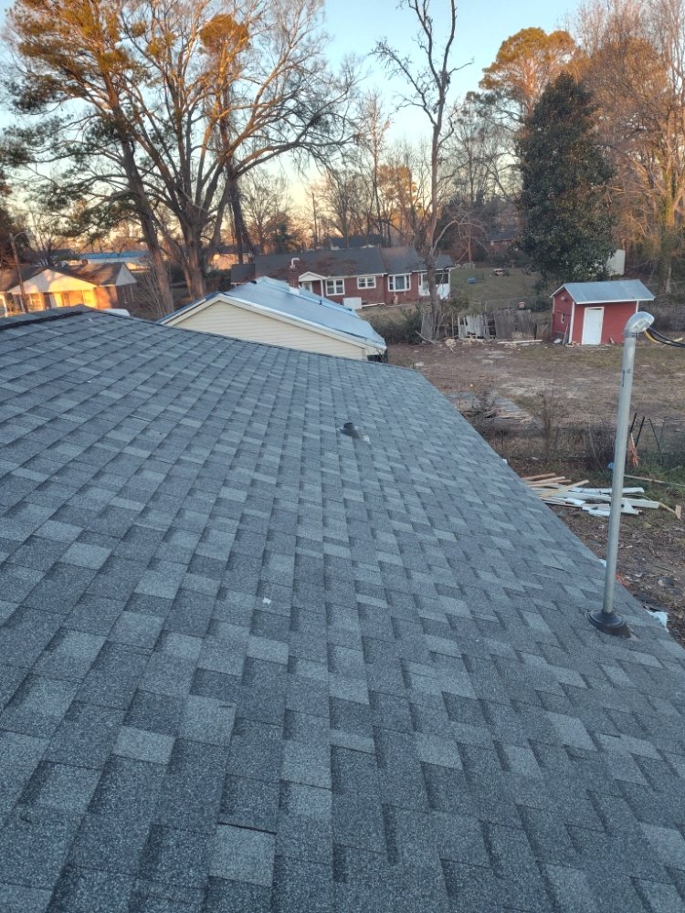 Slide of Two Son Roofing