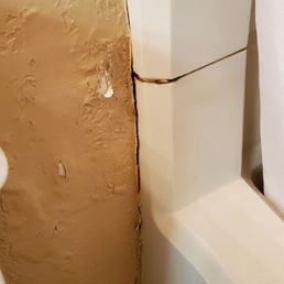 Cracks in bathroom wall Cracks in bathroom wall