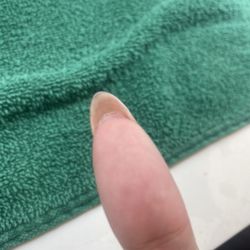 Paradise Tomball Nails & Spa - Acrylic peeling back from natural nail