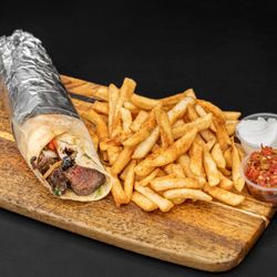 Shawarma Saj - Marinated beef (Rib-eye Steak) skewered and flame-grilled to perfection