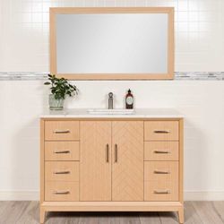 Modern Bathrooms.ca - 48 inch bathroom vanity in a light oak with herringbone design.