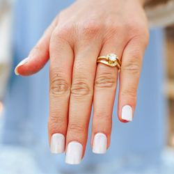 Elite Jewelers - My fianceé wearing the engagement ring