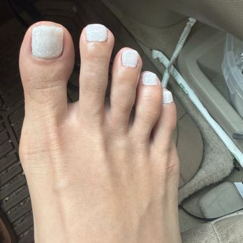 Blooming Nails - Painful cuticle removal that I didn't ask for but like on my toe was a little inflamed because I think more than the cuticle was removed - Nail Salons Near Me - Urban Honolulu, Hawaii