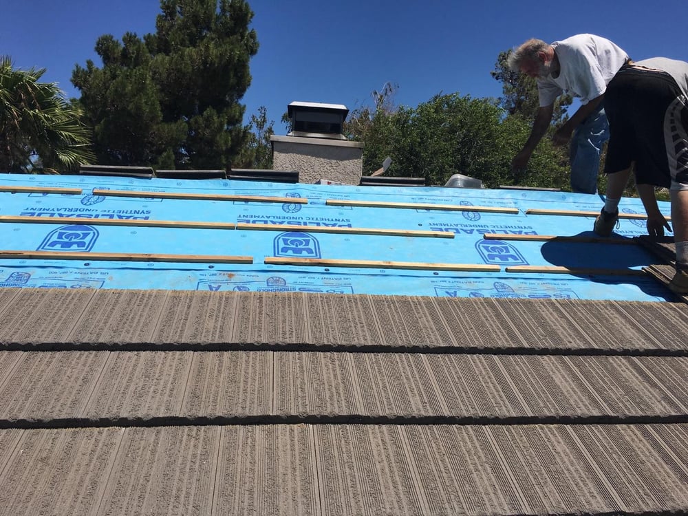 Slide of The Roof Repair Guy