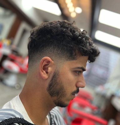 Cuts and Line Ups - GT8 Barbershop is your destination for a precision haircut and shave. Our team of expert barbers have well-regarded reputations from the many years of mastering their skill and craft. From fades to scissor cuts, razor shaves to intricate designs, GT8 Barbershop provides an elite experience with surpassing quality. Find us in Little Italy (416) 546-0226.