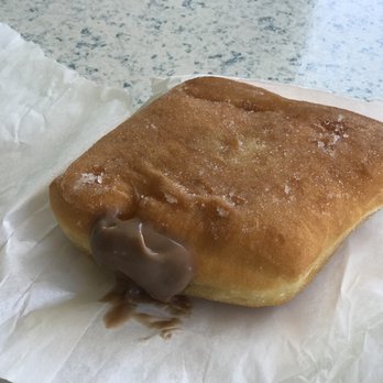Tex Drive In - Malasada is a Portuguese donut filled with a Bavarian type filling. - Fast Food Near Me - Honokaa, Hawaii