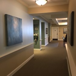 Oak Cottage of Santa Barbara Memory Care - Hallway- note crown molding handrails