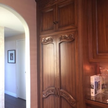 Jeannot Fine Furniture - My pantry has hand-carved grape leaves on the doors and goes floor to ceiling making the most of a small space. - Interior Design Near Me - Van Nuys, California