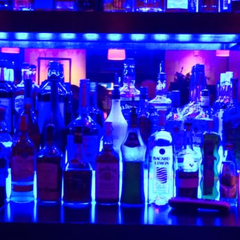 Cafe Catula - Beautifully lit bottles at the bar - Seafood Near Me - Miami, Florida Cafe Catula - Beautifully lit bottles at the bar - Seafood Near Me - Miami, Florida