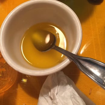El Meson - "Butter" aka Oil for $1.99 that wasn't touched because it tasted disgusting. - Mexican Near Me - Freehold, New Jersey El Meson - "Butter" aka Oil for $1.99 that wasn't touched because it tasted disgusting. - Mexican Near Me - Freehold, New Jersey