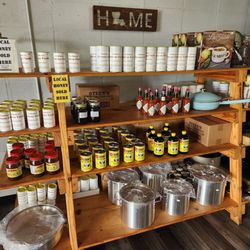 Famous Foods - Seasonings and other items for sale in the dining room.