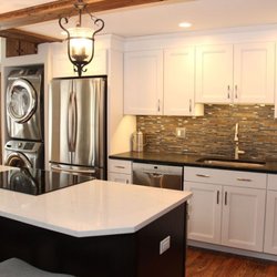 Creative Countertops - AFTER! Quartz with electric stovetop cut out; soapstone with sink cut out.