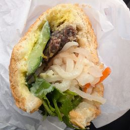 Sad $12 banh mi. Flavor is there but one slice of beef?!?