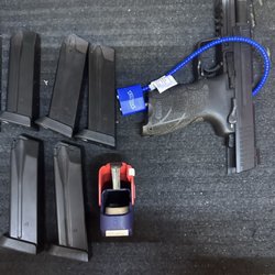 West Side Rifle & Pistol Range - Practice safe handling of my HK 45 Cal Pistol, gun pointing downrange and have a magazine lock for safe precautions going to the range