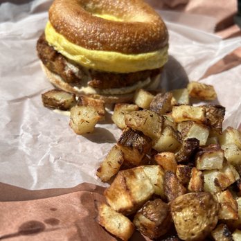 Crust Punk Baking - a bagel sandwich and potatoes - Bagels Near Me - Charlotte, North Carolina Crust Punk Baking - a bagel sandwich and potatoes - Bagels Near Me - Charlotte, North Carolina