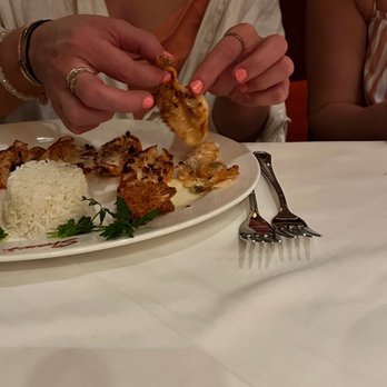 Shaw's Crab House - Peeling the skin (and all of the flavor) off the smashed shrimp. - Seafood Near Me - Chicago, Illinois