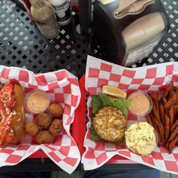 Lobster roll, hush puppies, crab cake, sweet potato fries, and potato salad. Lobster roll, hush puppies, crab cake, sweet potato fries, and potato salad.