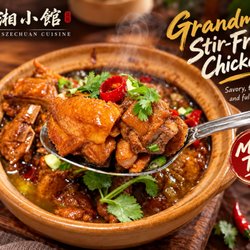 Hunan Szechuan Cuisine - Braised chicken with chilies and fresh herbs in a savory sauce. Tender, flavorful, and great with rice.