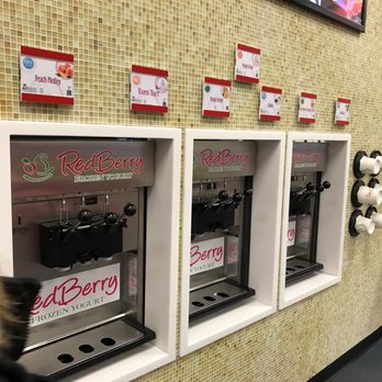 RedBerry - a woman standing in front of a row of machines - Juice Bars & Smoothies Near Me - Ewing, New Jersey RedBerry - a woman standing in front of a row of machines - Juice Bars & Smoothies Near Me - Ewing, New Jersey