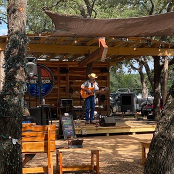 Planet Rock Vodka Distillery - a man playing guitar - Distilleries Near Me - Austin, Texas Planet Rock Vodka Distillery - a man playing guitar - Distilleries Near Me - Austin, Texas