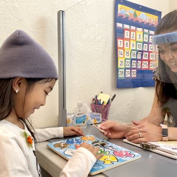 Whole Child Therapy - Speech therapy with a plexiglass barrier and face shield when the client needs to see the therapist's mouth for articulation. - Speech Therapists Near Me - Claremont, California Whole Child Therapy - Speech therapy with a plexiglass barrier and face shield when the client needs to see the therapist's mouth for articulation. - Speech Therapists Near Me - Claremont, California