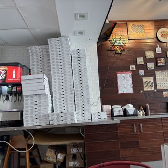 Nolita Pizza - Counter with hot honey - Pizza Near Me - New York, New York