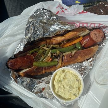 High Ridge Adventures Outfitting and BBQ - Spicy Smoked sausage sandwich with the peppers and onions, potato salad side - Barbeque Near Me - Marshall, North Carolina High Ridge Adventures Outfitting and BBQ - Spicy Smoked sausage sandwich with the peppers and onions, potato salad side - Barbeque Near Me - Marshall, North Carolina
