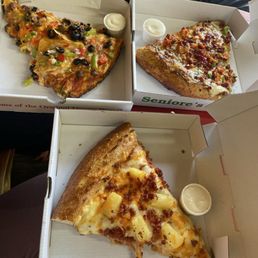 The taco pizza, nacho pizza and Hawaiian pizza The taco pizza, nacho pizza and Hawaiian pizza