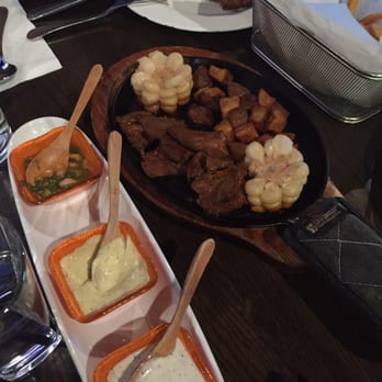 Pollos & Jarras - Anticuchos with potatoes and choclo! Try the sauces!! - Peruvian Near Me - Miami, Florida