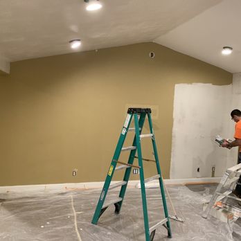 Marc's Drywall - In the process of smooth texturing the walls. First coat! - Drywall Installation & Repair Near Me