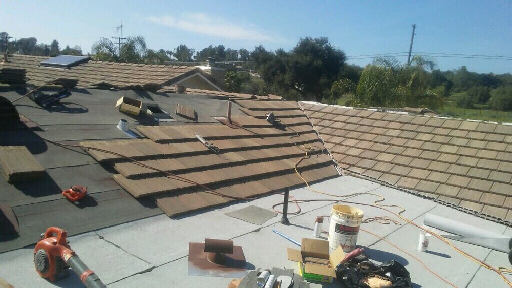 Slide of Vulcan Roofing Co