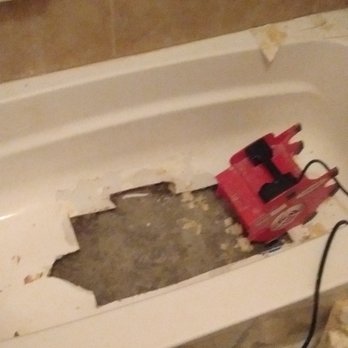 California Bath & Kitchen - Samuel cut out bottom portion and removed foam and other material from tub prior to applying concrete. - General Contractors Near Me - San Diego, California California Bath & Kitchen - Samuel cut out bottom portion and removed foam and other material from tub prior to applying concrete. - General Contractors Near Me - San Diego, California