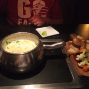 Photo of The Melting Pot - Fort Collins, CO, United States. Spinach artichoke cheese fondu.