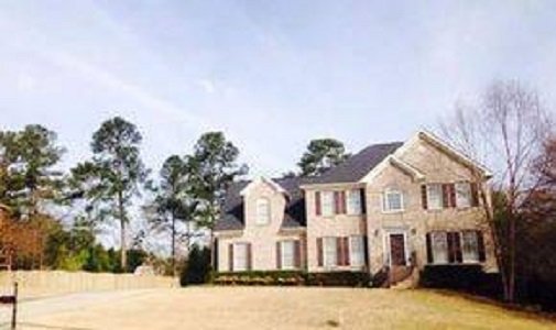 Magnum Construction Logo