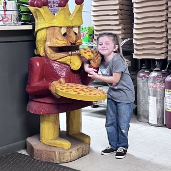 Battle Ground Pizza King - a young boy eating a pizza - Pizza Near Me - Battle Ground, Indiana Battle Ground Pizza King - a young boy eating a pizza - Pizza Near Me - Battle Ground, Indiana