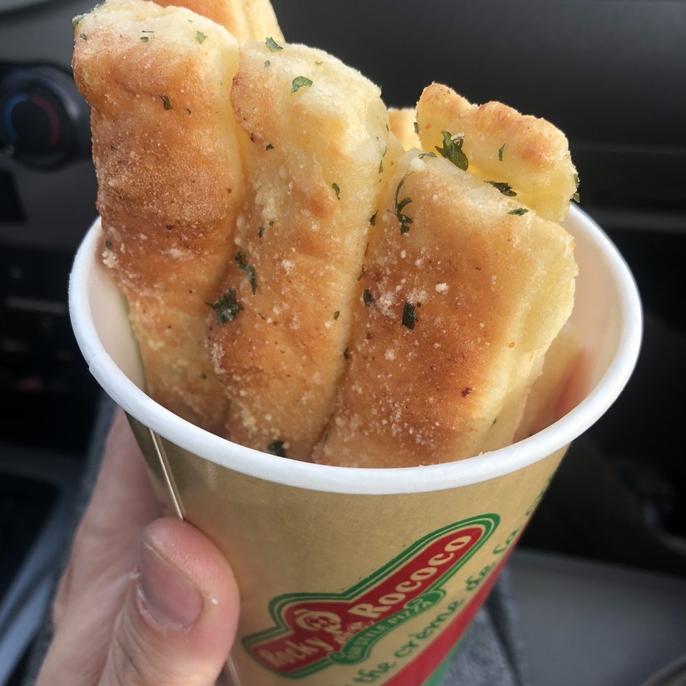 Rocky Rococo - 6 Breadsticks - kinda fake buttery tasting. Not bad, not great either - Pizza Near Me - Milwaukee, Wisconsin Rocky Rococo - 6 Breadsticks - kinda fake buttery tasting. Not bad, not great either - Pizza Near Me - Milwaukee, Wisconsin