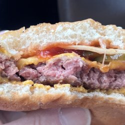 McDonald's - The half eaten raw Quarter Pounder with Cheese