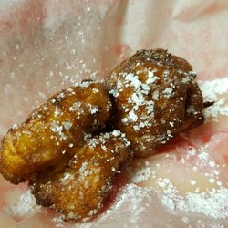 Cowtown Cafe - Amazing and delicious fried bread pudding! A delicious vanilla cream sauce coming out of the pudding. So yummy and warm. Must grab some!