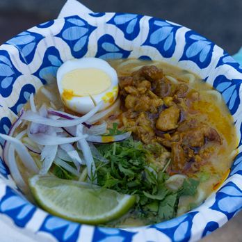 Queens Night Market - From Burmese Bites: Ohno Kaukswe (Coconut Chicken Noodle Soup) $6. Get this. - Food Stands Near Me - Corona, New York Queens Night Market - From Burmese Bites: Ohno Kaukswe (Coconut Chicken Noodle Soup) $6. Get this. - Food Stands Near Me - Corona, New York