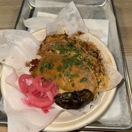 Chicken militia with pickled onions and roasted jalapeño pepper Chicken militia with pickled onions and roasted jalapeño pepper