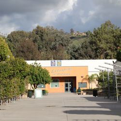 Poway High School - Looking down the science hall decorated with luscious greenery onto the PHS Library.